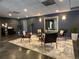 The building's modern lobby is complete with lounge furniture at 888 N Logan St # 2C, Denver, CO 80203