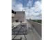 Rooftop terrace with an outdoor dining area and city views, enhancing urban living at 888 N Logan St # 2C, Denver, CO 80203
