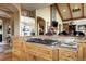 Gourmet kitchen features granite countertops and a high end gas range at 580 Summer Mist Cir, Castle Rock, CO 80104