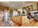 Open kitchen with stainless steel appliances and a large island at 580 Summer Mist Cir, Castle Rock, CO 80104