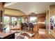 Well lit kitchen featuring wood cabinets, granite countertops, and bar seating at 580 Summer Mist Cir, Castle Rock, CO 80104
