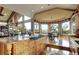 Stylish kitchen with granite countertops, and views of the green landscape at 580 Summer Mist Cir, Castle Rock, CO 80104