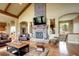 Inviting living room with stone fireplace and comfortable seating at 580 Summer Mist Cir, Castle Rock, CO 80104