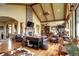 Spacious living room boasts a stone fireplace, high ceilings, and ample natural light at 580 Summer Mist Cir, Castle Rock, CO 80104