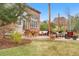 Relax in the cozy back patio featuring comfortable seating, perfect for outdoor dining and gatherings at 286 Claymoor Ct, Castle Pines, CO 80108