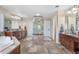 Open bathroom with dual vanities, granite counters, and a glass-enclosed shower for a luxurious feel at 286 Claymoor Ct, Castle Pines, CO 80108
