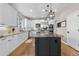 Bright, modern kitchen with granite countertops and stainless-steel appliances at 286 Claymoor Ct, Castle Pines, CO 80108