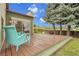Inviting back deck with a chair and an outdoor space perfect for relaxation or entertaining at 12671 W Dakota Dr, Lakewood, CO 80228