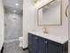 Stylish bathroom showcases a glass-enclosed shower, modern vanity, and sleek fixtures for a contemporary feel at 12671 W Dakota Dr, Lakewood, CO 80228
