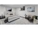 Bedroom features carpet, modern bed, neutral walls, and stylish decor at 12671 W Dakota Dr, Lakewood, CO 80228