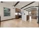 Modern kitchen with stainless steel appliances and eat-in island at 12671 W Dakota Dr, Lakewood, CO 80228