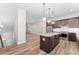 Stylish kitchen with center island and stainless steel appliances provides ample counter space at 5165 Vivian St, Wheat Ridge, CO 80033