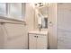 Bathroom featuring updated vanity, mirror, and lighting at 8097 E Lehigh Dr, Denver, CO 80237