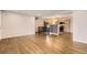 Spacious living room with beautiful hardwood floors and an open concept design at 8097 E Lehigh Dr, Denver, CO 80237