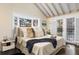 View of Main Bedroom featuring bay window, access to outdoor patio and lots of natural light at 700 Holly St, Denver, CO 80220