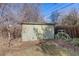 Backyard shed with fencing and play structure at 700 Holly St, Denver, CO 80220