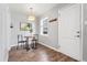 Small dining area with a round table and two chairs at 1157 Krameria St, Denver, CO 80220