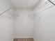 Bright walk-in closet featuring modern flooring and wire shelving at 4896 S Dudley St # 8, Littleton, CO 80123