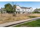 Townhouse exterior view showing multiple units at 9618 W Chatfield Ave # E, Littleton, CO 80128