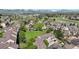 Expansive aerial view of the community with lush landscaping and mountain views at 6809 S Webster St # F, Littleton, CO 80128