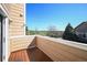 Private balcony offers outdoor relaxation with scenic views of the neighborhood and clear blue sky at 6809 S Webster St # F, Littleton, CO 80128