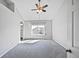 Spacious bedroom with a vaulted ceiling and sun-filled window at 6809 S Webster St # F, Littleton, CO 80128