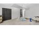 Finished basement with carpet, a modern desk and ample storage at 982 S Holly St, Denver, CO 80246