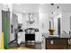 Well-equipped kitchen featuring stainless steel appliances and ample storage at 982 S Holly St, Denver, CO 80246