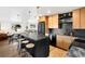 Contemporary kitchen with an island, wood cabinets, stainless steel appliances, and an open layout at 1029 N Columbine St, Golden, CO 80403