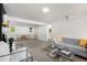 Spacious living room with comfortable seating, neutral tones, and ample natural light at 1029 N Columbine St, Golden, CO 80403