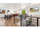 Bright, open floor plan with modern furnishings, seamlessly connecting the living and dining areas at 1029 N Columbine St, Golden, CO 80403