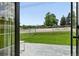 View of backyard and open area from patio at 9175 Cole Dr, Arvada, CO 80004
