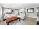 Inviting living room with wood floors, light grey walls, and lots of natural light at 9175 Cole Dr, Arvada, CO 80004