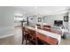 Open-concept living room and dining area with plenty of natural light and space for entertaining at 9175 Cole Dr, Arvada, CO 80004