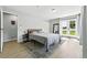 Bright main bedroom featuring French doors and a walk-in closet at 9175 Cole Dr, Arvada, CO 80004