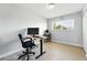 Office featuring large desk, swivel chair, and natural light at 9175 Cole Dr, Arvada, CO 80004