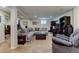 Spacious basement living room with comfortable seating, entertainment center, and lots of light at 6775 Coors Ct, Arvada, CO 80004