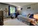 Spacious bedroom with a gray wall decor at 6775 Coors Ct, Arvada, CO 80004