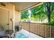 Relaxing covered balcony offering a peaceful outdoor retreat, perfect for enjoying nature at 2895 W Riverwalk Cir # 104, Littleton, CO 80123