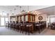 Community bar area featuring seating, a bar, and lots of glasses at 2895 W Riverwalk Cir # 104, Littleton, CO 80123
