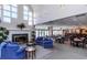Large lounge featuring a fireplace, comfortable seating, and plenty of space for entertaining at 2895 W Riverwalk Cir # 104, Littleton, CO 80123