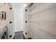 Pantry with ample wire shelving and added storage capacity at 2895 W Riverwalk Cir # 104, Littleton, CO 80123