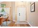 Inviting home foyer featuring beautiful wood flooring and a bright entry at 9756 Quay Loop, Broomfield, CO 80021