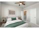 Inviting bedroom with a comfortable bed, stylish decor, and ample natural light at 630 E Hinsdale Ave, Littleton, CO 80122