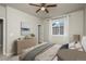 Comfortable main bedroom featuring a cozy bed and stylish decor at 630 E Hinsdale Ave, Littleton, CO 80122