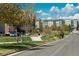 An attractive apartment complex with balconies, set along a landscaped street with mature trees at 630 E Hinsdale Ave, Littleton, CO 80122