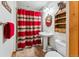 Bathroom featuring a pedestal sink and decorative wall accents at 960 Whispering Pines Ln, Breckenridge, CO 80424