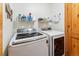 Well-equipped laundry room with modern washer and dryer at 960 Whispering Pines Ln, Breckenridge, CO 80424