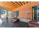 Private deck and outdoor space with wood ceiling at 960 Whispering Pines Ln, Breckenridge, CO 80424