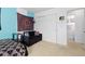 Bedroom with large closet, carpet flooring, and comfy seating at 19411 E Milan Cir, Aurora, CO 80013